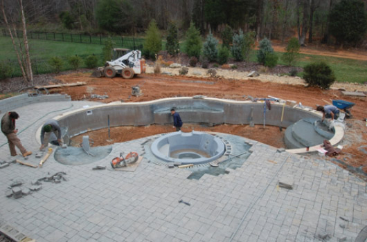 Vinyl Liner Process Pavers are being set